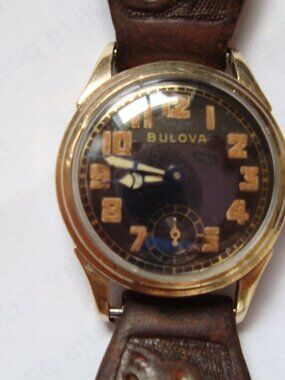 VINTAGE LADY WIND UP BULOVA WW2 MILITARY STYLE,10K GOLD CLAPS TOP, STERLING BACK